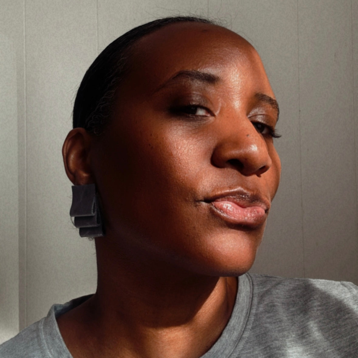 new! "gray, never fold" leather earrings