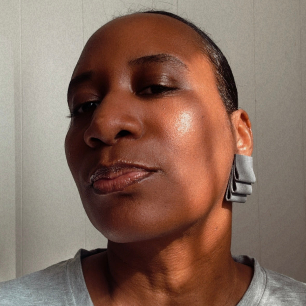 new! "gray, never fold" leather earrings